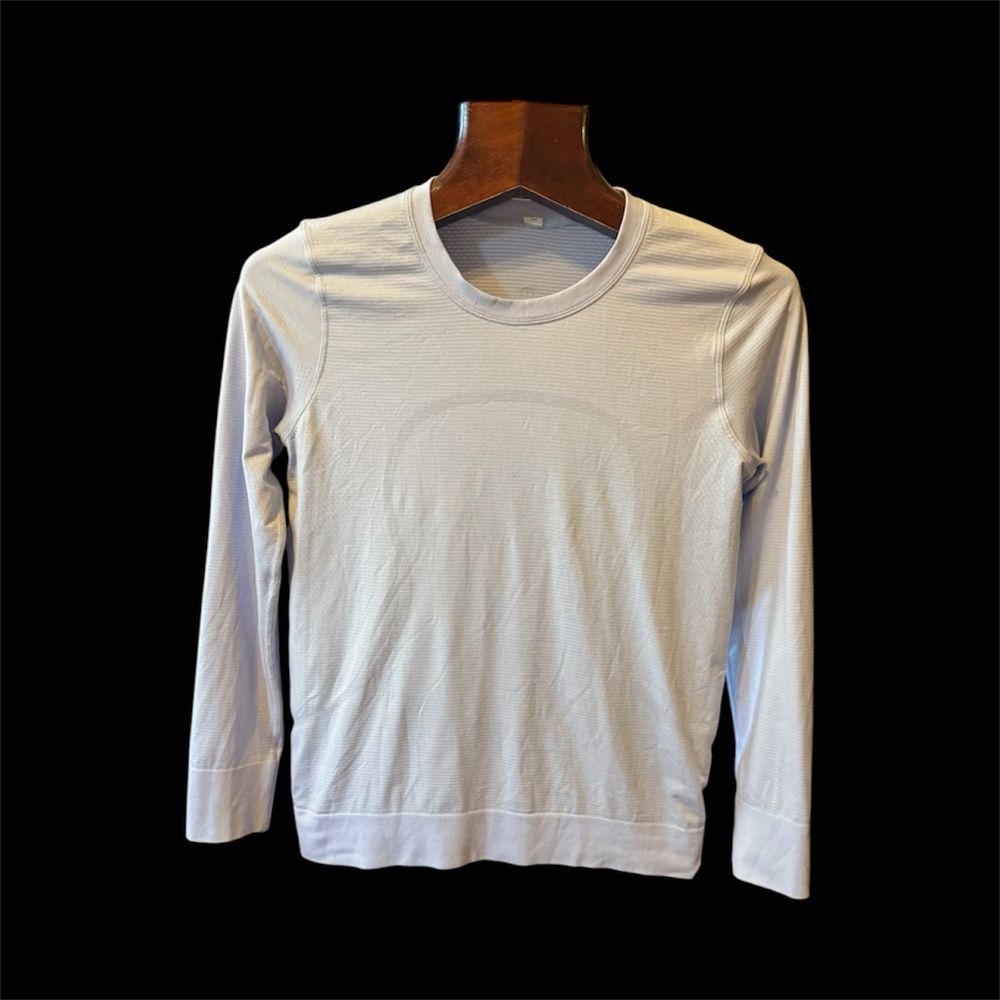 Light blue Lululemon Long Sleeve anti sweat thin sweater size 8 used twice